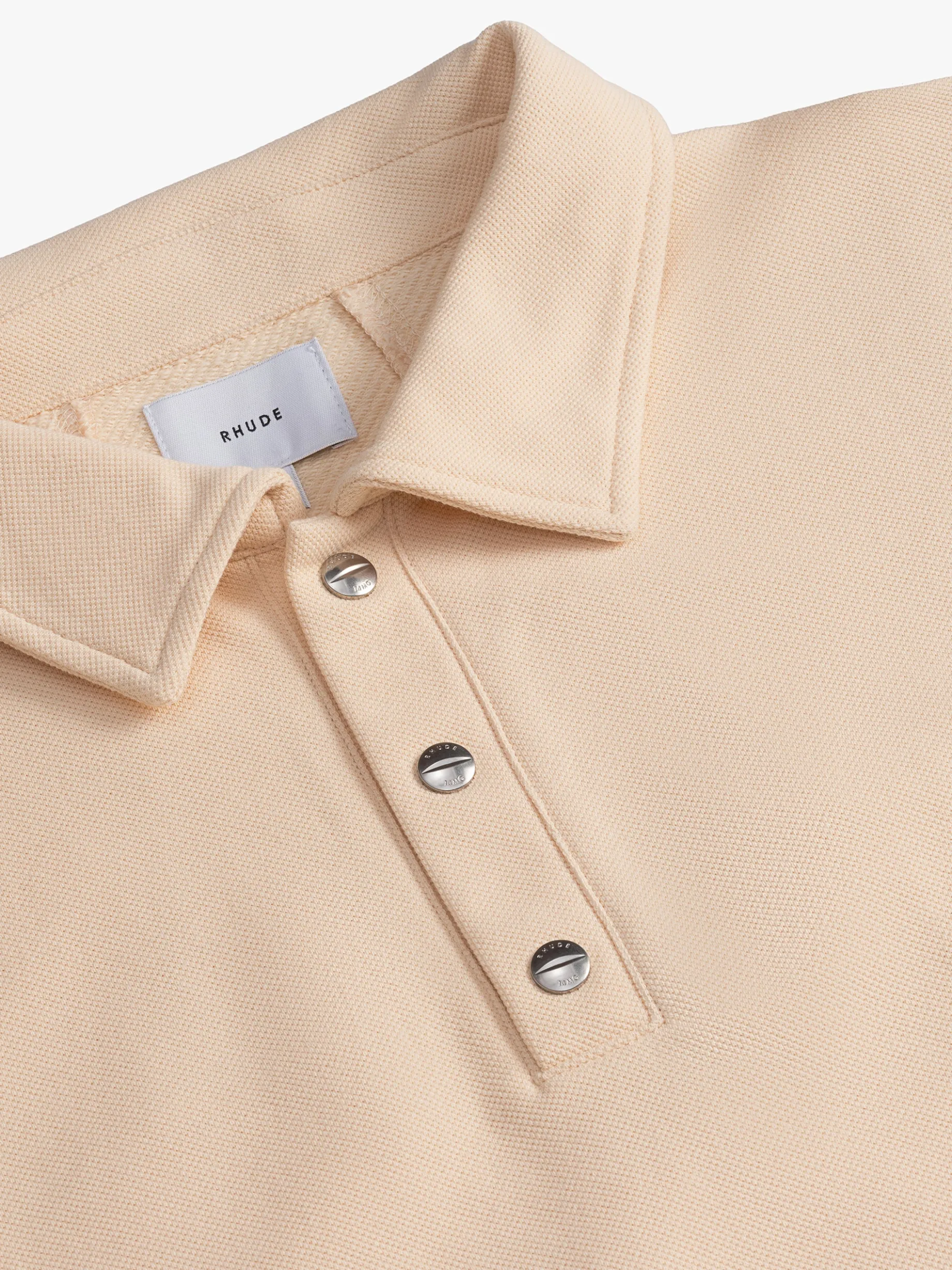 PIQUE SNAP SHORT SLEEVE POLO