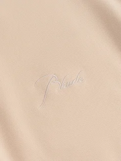 PIQUE SNAP SHORT SLEEVE POLO